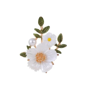 Broche représentant des fleurs de cerisier blanches sur fond neutre