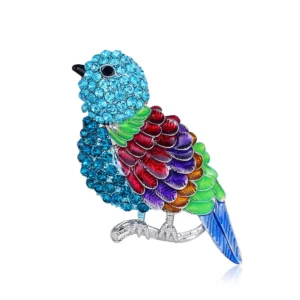 Broche représentant un oiseau en strass bleu