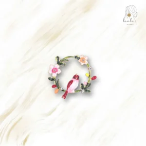 Broche Oiseau Dans Sa Couronne De Fleurs