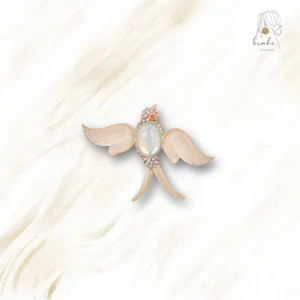 Broche Oiseau Œil Rouge